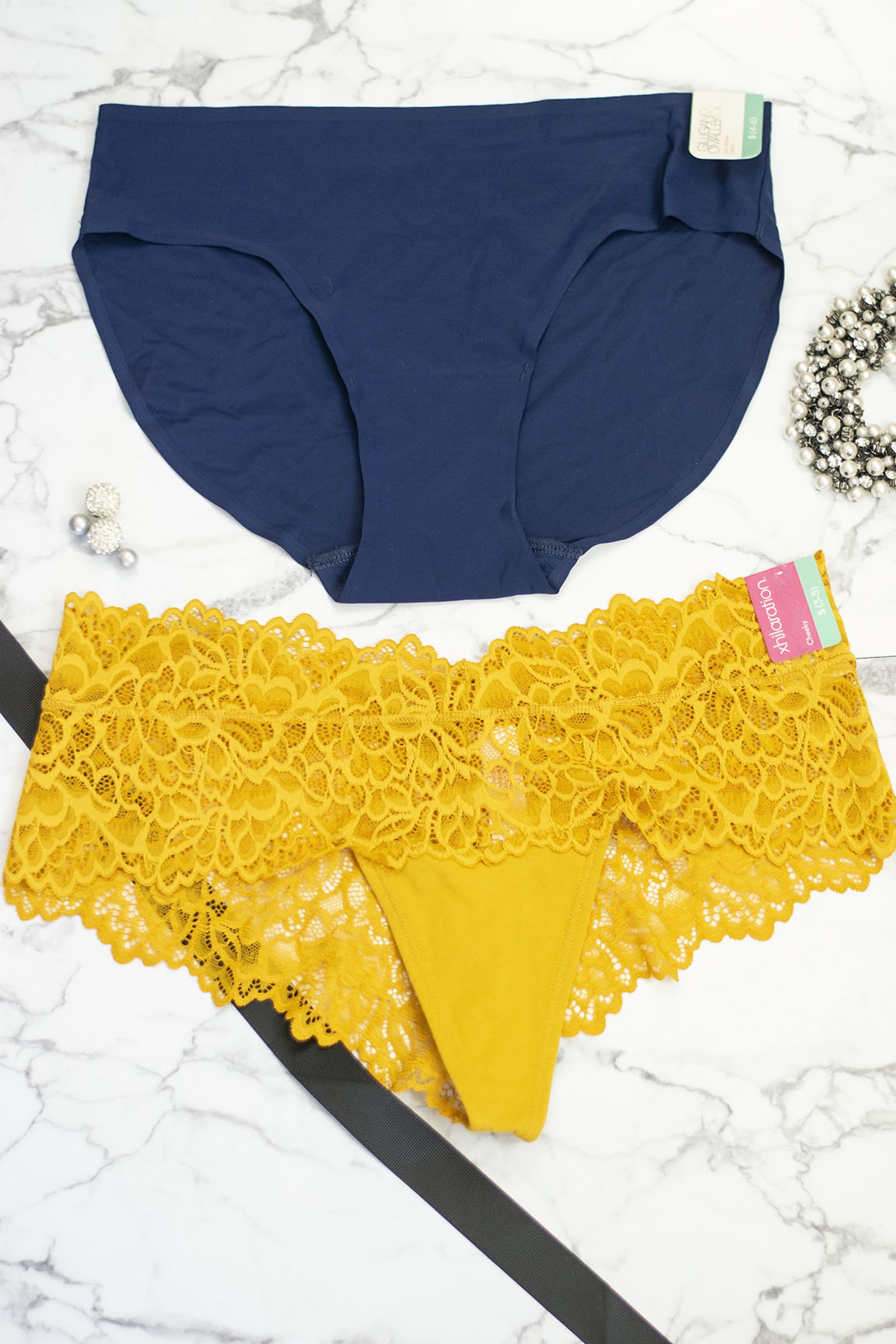 Two women's underwear in yellow and blue colour